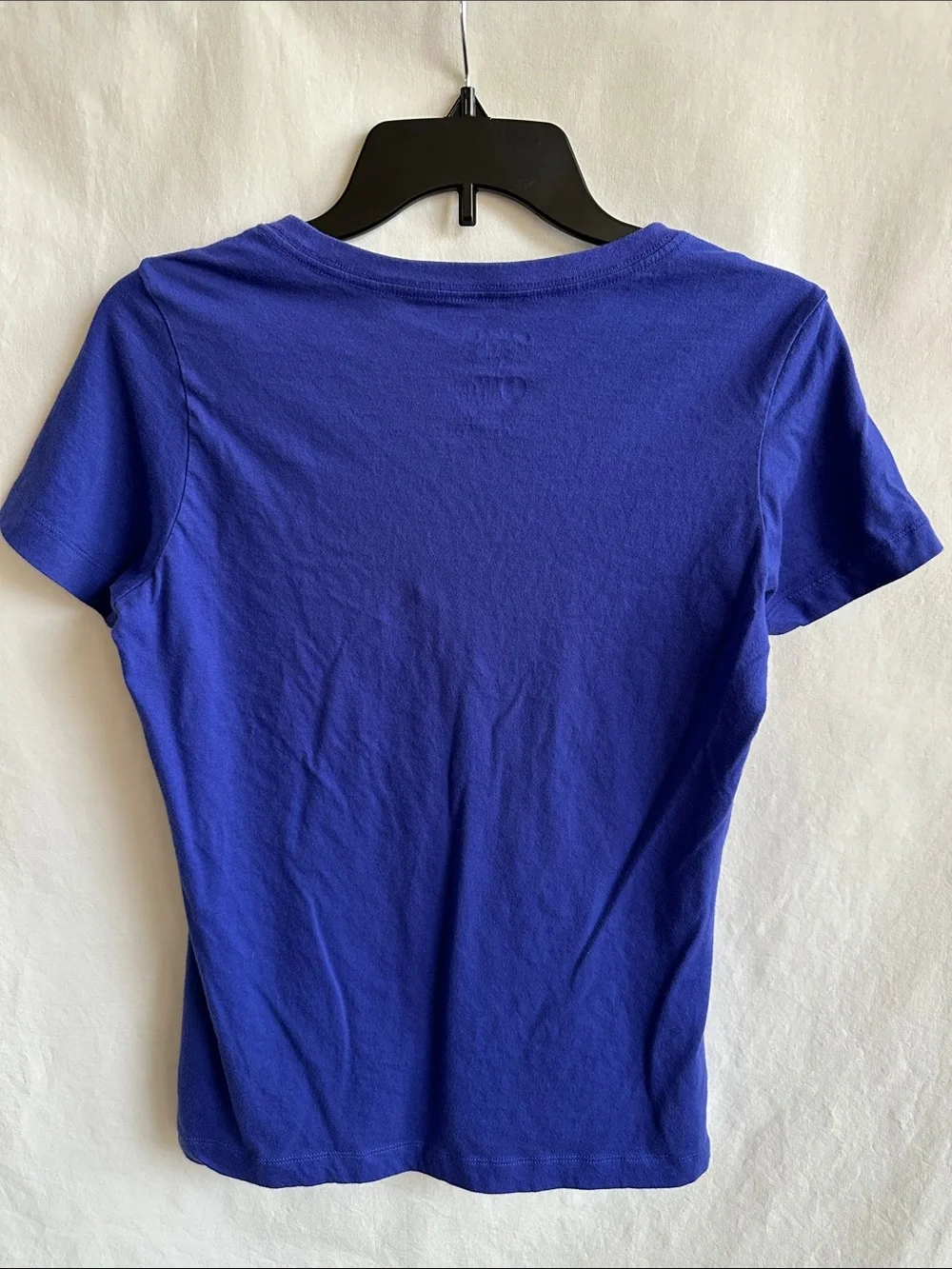 Nike blue V-neck athletic T-shirt with a white embroidered swoosh logo - Picture 2 of 7